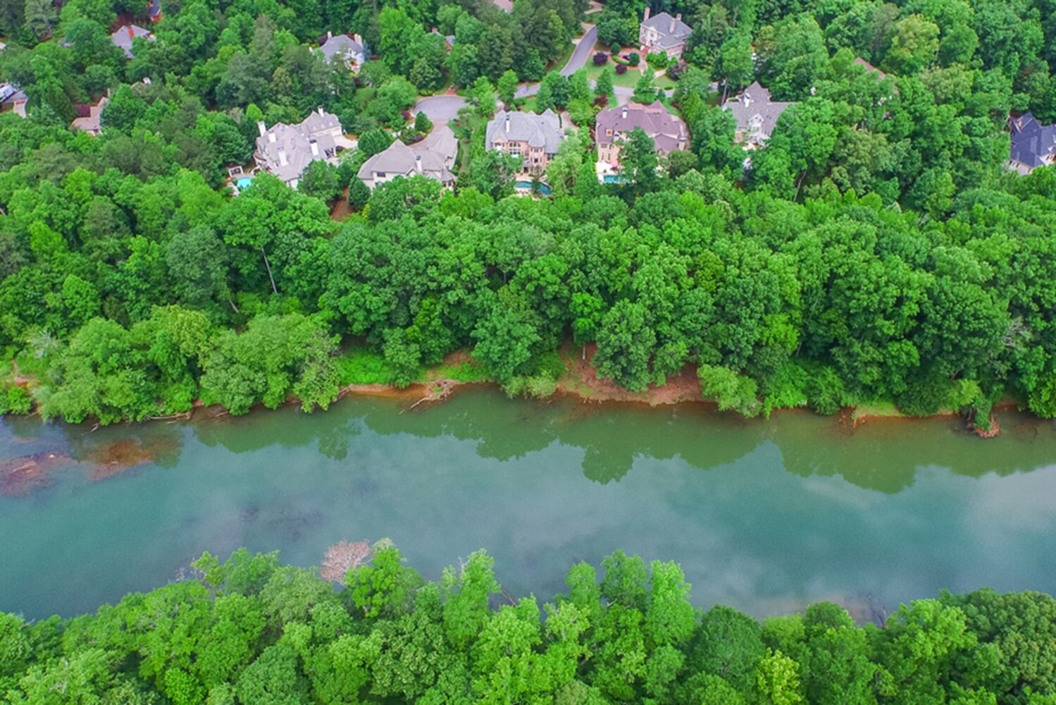 $4.3 buys a 'prestigious' Johns Creek home with resort-like pool and river views