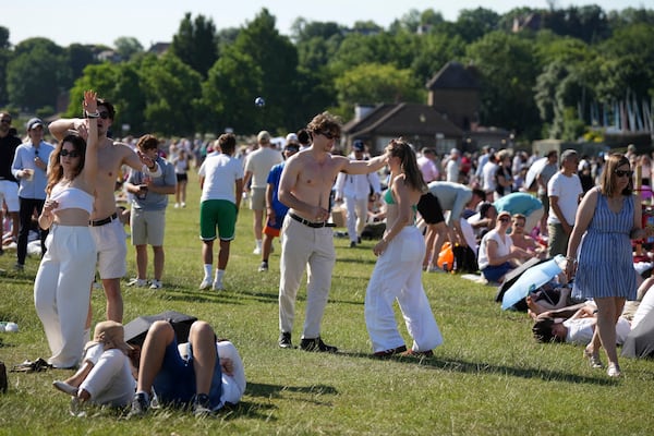 People queue at the entrance on the first day of the Wimbledon Tennis Championships in London, Monday, June 30, 2025. (AP Photo/Alastair Grant)