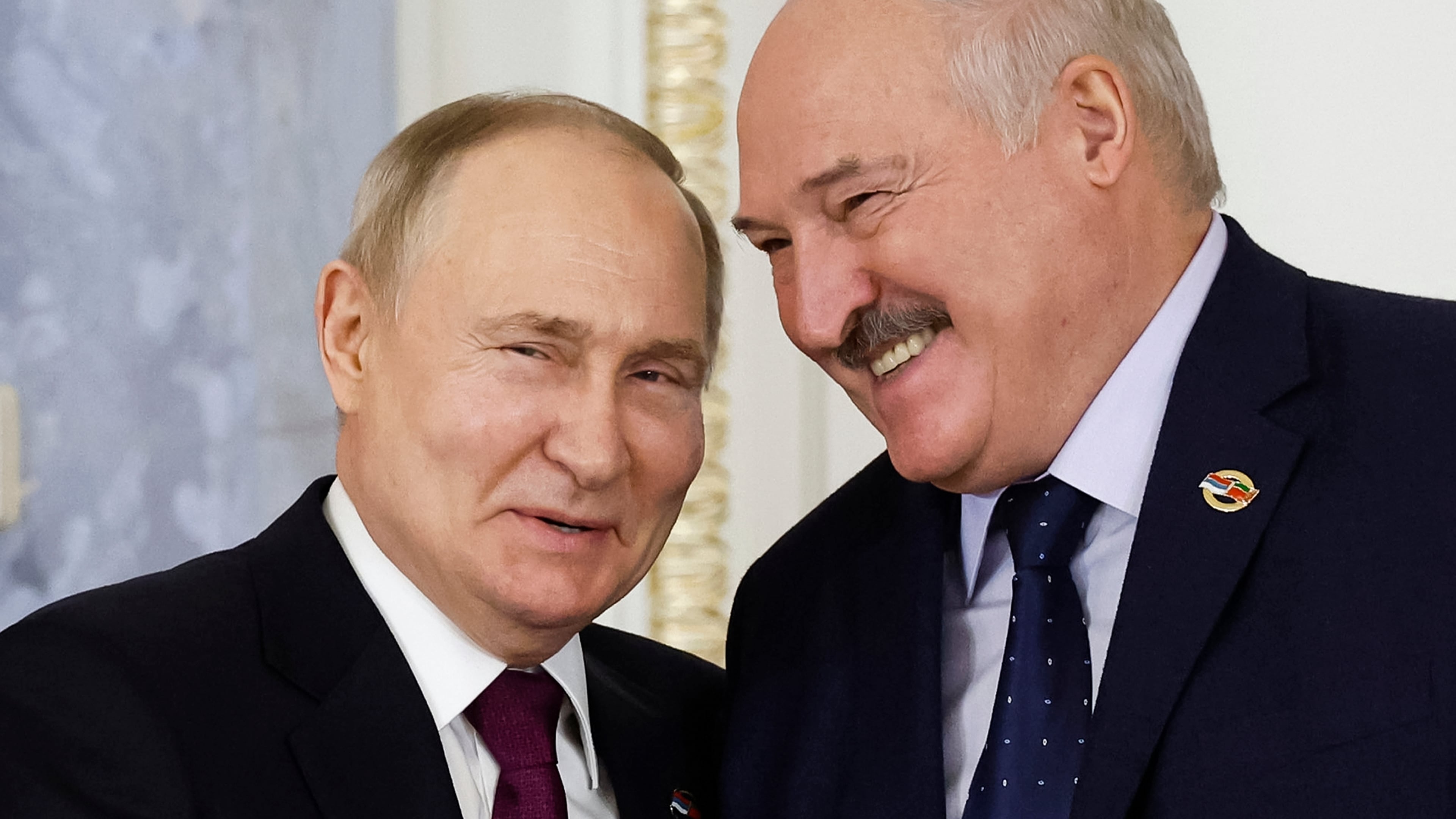FILE - Russian President Vladimir Putin, left, and Belarusian President Alexander Lukashenko shake hands during a meeting in St. Petersburg, Russia, Jan. 29, 2024. (Dmitry Astakhov, Sputnik, Government Pool Photo via AP, File)