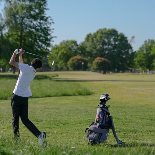 The Washington Monument stands in the background as Roman Sandoli swings at the East Potomac Golf Course, Sunday, May 3, 2026, in Washington. (AP Photo/Julia Demaree Nikhinson)