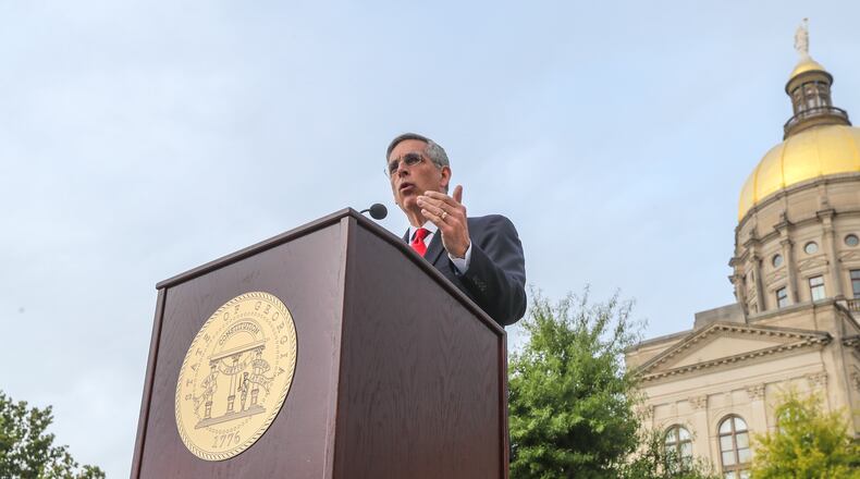 September 8, 2020 Atlanta: Secretary of State Brad Raffensperger announced Tuesday, Sept. 8, 2020 that 1,000 Georgians voted twice in the state’s June 9 primary, a felony that he said will be prosecuted to the fullest extent of the law during a press conference at Liberty Plaza across from the Georgia State Capitol. These voters returned absentee ballots and then also showed up to vote on election day June 9, Raffensperger said. County election officials are able to stop double-voting most of the time, but they weren’t able to catch everyone. “A double voter knows exactly what they’re doing, diluting the votes of each and every voter that follows the law,” Raffensperger said. “Those that make the choice to game the system are breaking the law. And as secretary of state, I will not tolerate it.” Double-voting didn’t change the outcome of any races in the primary, Raffensperger said. (John Spink / John.Spink@ajc.com)