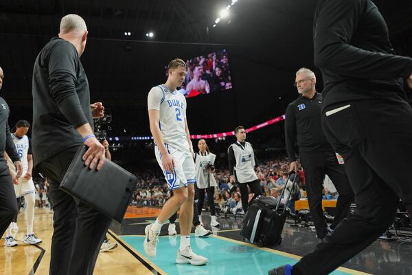 Duke's Cooper Flagg (2) leaves the court after Duke lost to Houston in the national semifinals at the Final Four of the NCAA college basketball tournament, Saturday, April 5, 2025, in San Antonio. (AP Photo/Eric Gay)