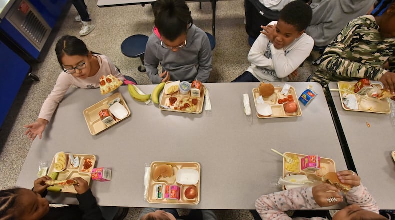 Students eat their lunches during a lunch break at Corley Elementary School on Wednesday, Dec. 12, 2018. Several Gwinnett County Schools are participating in a food audit this year to identify food waste and find a way to reduce it. HYOSUB SHIN / HSHIN@AJC.COM