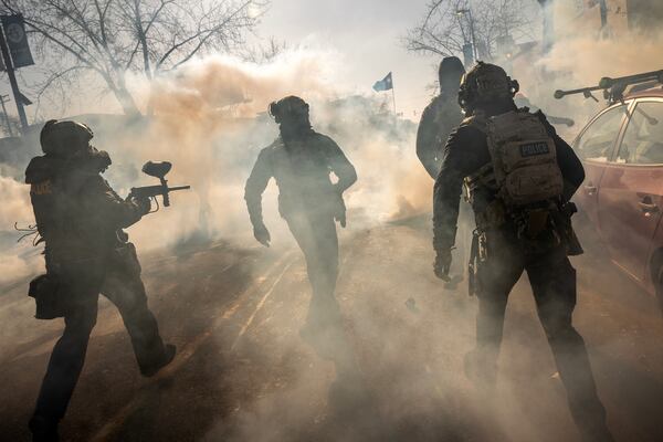 Federal agents used tear gas and deadly force as they confronted demonstrators in  Minneapolis over the weekend. (David Guttenfelder/The New York Times)