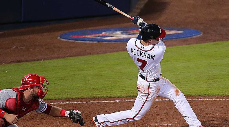 DUNEDIN, FL - MARCH 07: Gordon Beckham #7 of the Atlanta Braves makes a throw to first base during the sixth inning of a spring training game against the Toronto Blue Jays at Florida Auto Exchange Stadium on March 7, 2016 in Dunedin, Florida. (Photo by Stacy Revere/Getty Images)