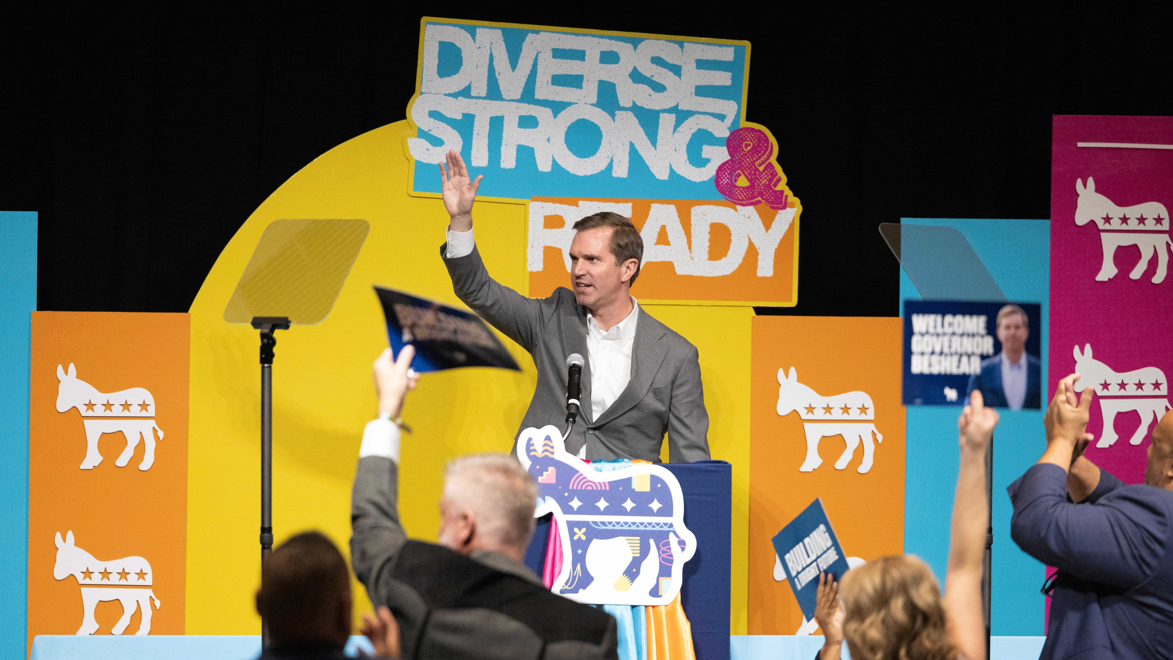 FILE - Kentucky Gov. Andy Beshear waves to a cheering crowd after his speech during the Ben Nelson Gala Nov. 7, 2025, in Omaha, Neb. (AP Photo/Rebecca S. Gratz, File)