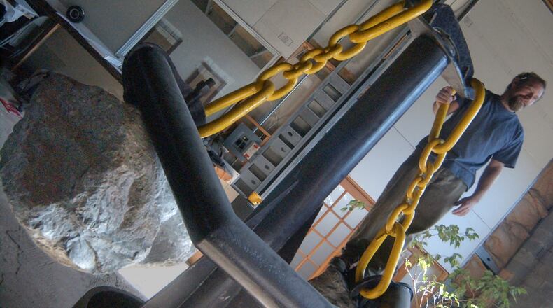 Zachary Coffin on one of his 'monumental works'- A development called B Complex on Murphy Avenue near the Oakland City MARTA station in October 2003.