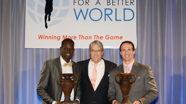Dau Jok of Penn (collegiate winner), Northup, Brees at 2014 Wooden Citizenship Cup. (Special to the AJC)