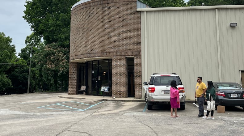 Isis Romero (left) speaks with GLAHR's Giovani Serrano after the latter led a know-your-rights gathering at a Hispanic church Canton, where he discussed House Bill 1105 on Saturday, June 1, 2024.