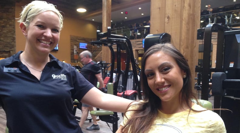 Teressa Stann (right), executive director of the nonprofit LRJ Foundation, with Amy Tully, marketing director of Onelife Fitness in Cumming. Stann recently partnered with Onelife to raise funds for the foundation’s programming. GRACIE BONDS STAPLES / GSTAPLES@AJC.COM
