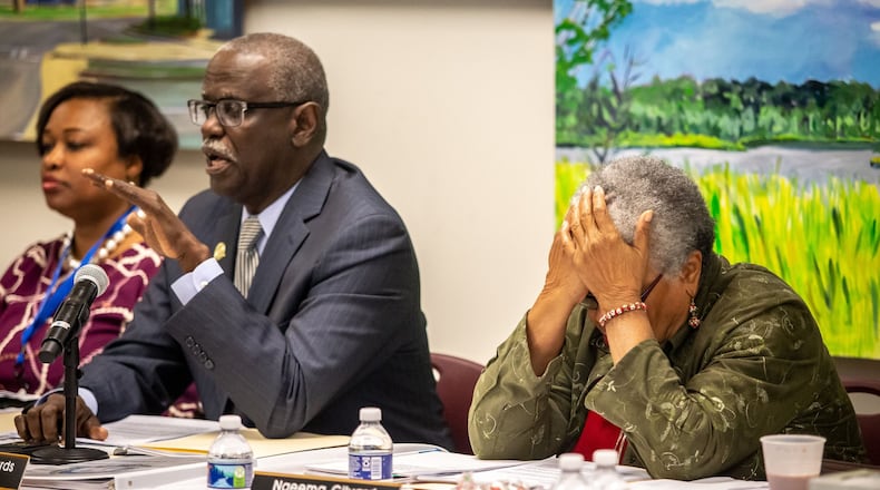 City Council Naeema Gilyard (R) reacts during a hearing to remove Mayor Bill Edwards and councilwoman Helen Zenobia Willis at the South Fulton City Hall, December 30, 2019. STEVE SCHAEFER / AJC FILE PHOTO