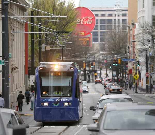 The Atlanta Streetcar makes its way up Peachtree Street in March. It stops at the King Historic District. BOB ANDRES /BANDRES@AJC.COM