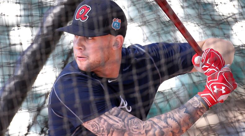 Braxton Davidson takes batting practice during spring training in 2016. Curtis Compton / ccompton@ajc.com