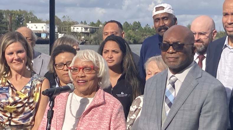 State Sen. Gloria Butler announces the election of Sen. Harold Jones II, right, as Senate minority leader Friday during a Georgia Senate Democratic Caucus retreat in Savannah.