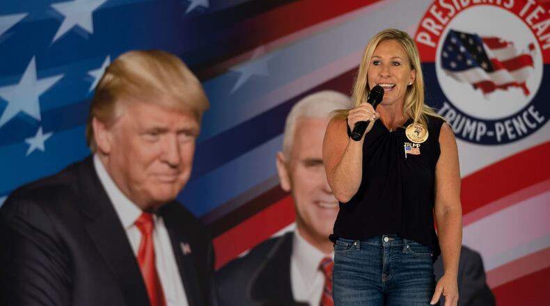 U.S. House staff stopped Republican Marjorie Taylor Greene today when she tried walking on the the chamber's floor without a face covering. Greene, who is set to be sworn into office later today as a U.S. representative, returned to the floor later wearing a mask that said “Trump Won.” Ben Gray for the Atlanta Journal-Constitution