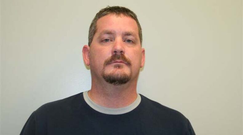 Former Holly Springs police officer Shane Ladner was arrested on several charges stemming from doubts about his claim to being a Purple Heart recipient.