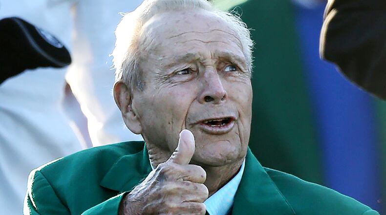 040716 AUGUSTA: Honorary starter Arnold Palmer gives the thumbs up from his chair on the first tee to help begin the Masters at Augusta National Golf Club on Thursday, April 7, 2016, in Augusta. Curtis Compton / ccompton@ajc.com
