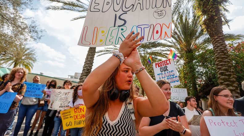 Sophie Craig, 19, cheers during a gathering after University of South Florida students and faculty members join a statewide student walkout to protest Gov. Ron DeSantis' education policies on Feb. 23, 2023. (Ivy Ceballo/Tampa Bay Times/TNS)