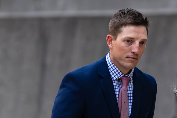 Former Grand Rapids Police officer Christopher Schurr enters the Kent County Courthouse in Grand Rapids, Mich. on Friday, May 2, 2025. (Joel Bissell /Kalamazoo Gazette via AP)