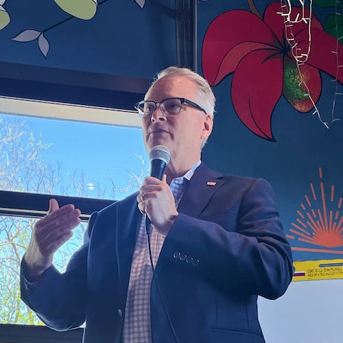 Adam Hamilton, a Methodist mega-church pastor from Kansas, talks to voters as he wraps up a U.S. Senate listening tour on Saturday, April 18, 2026, at Limitless Brewing in Lenexa, Kansas. (AP Photo/Heather Hollingsworth)