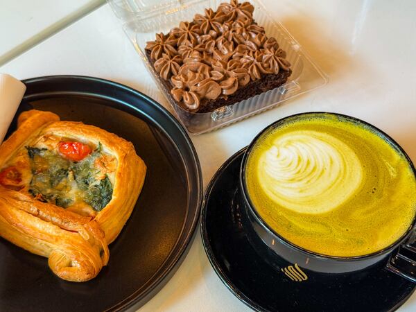 A spinach and tomato cheese danish, Nutella milk cake and pistachio latte from Haraz Coffee House.