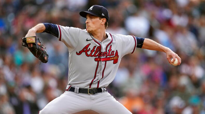 Atlanta Braves starting pitcher Max Fried works against the Colorado Rockies during the first inning of a baseball game Friday, June 3, 2022, in Denver. (AP Photo/David Zalubowski)