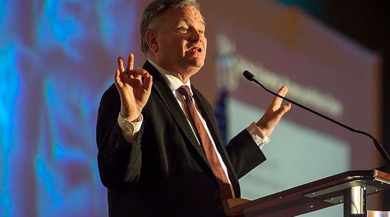 Roger Tutterow, director of the Econometrics Center at Kennesaw State University, speaking in 2020, weeks before the pandemic slammed the economies of Georgia, the nation and the world. (ALYSSA POINTER/ALYSSA.POINTER@AJC.COM)