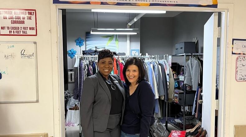 Jackie Duncan (left) pictured with donor Mara Davis, brought the Career Closet to employees at the Omni Hotel Atlanta Centennial Park, as part of the hotel's DEI initiatives. The closet is celebrating its one year anniversary and has helped employees from a range of departments find work appropriate clothing free of charge. Contributed photo.