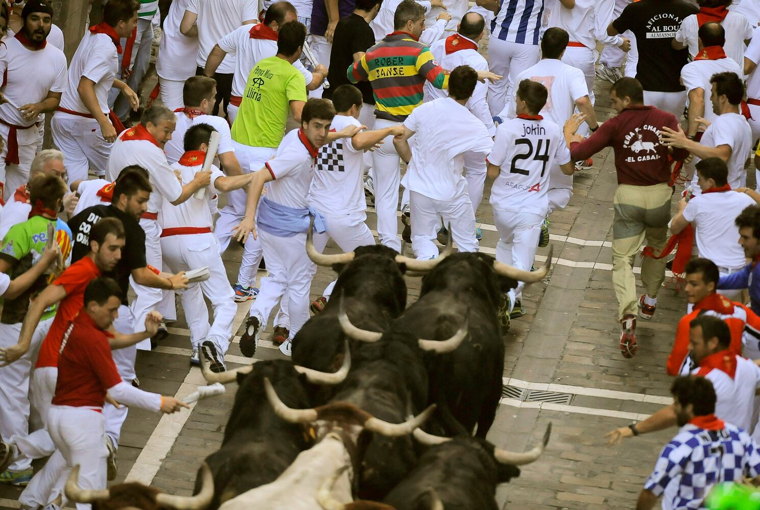 The running of the bulls at the San Fermin fiestas