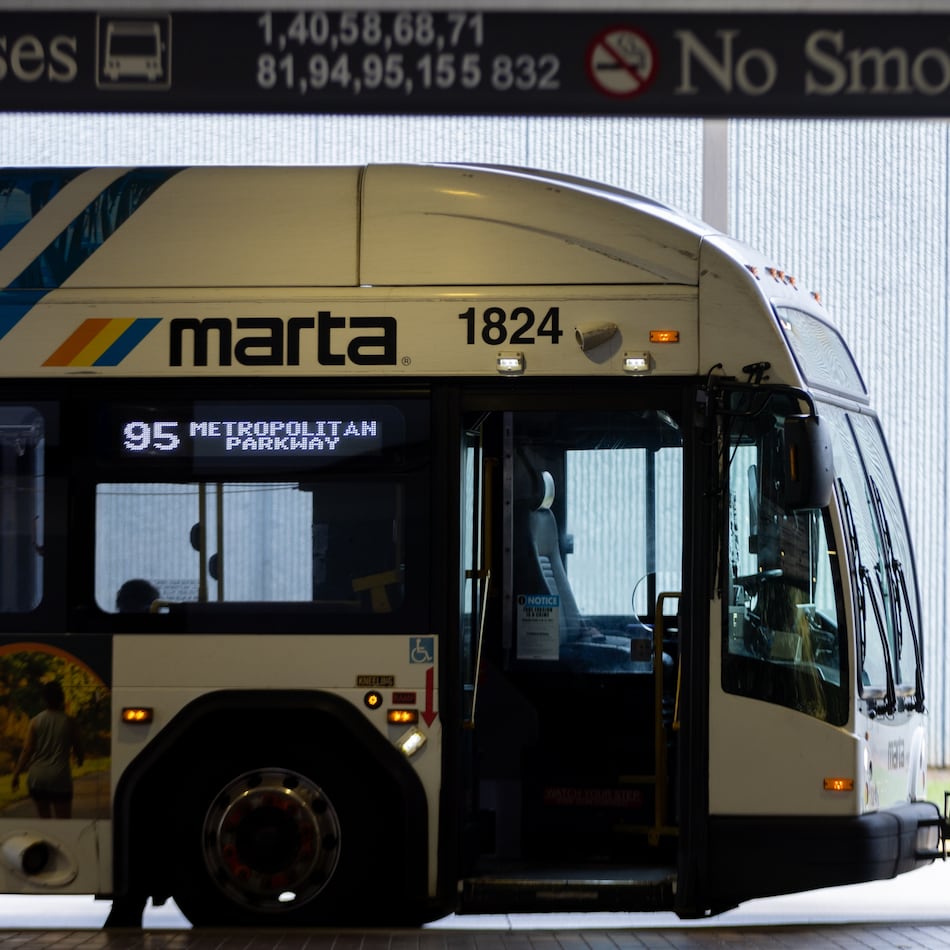 A bus driver waits at the West End MARTA station in Atlanta. (Arvin Temkar/AJC 2025)
