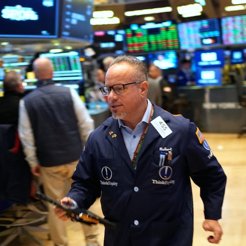Robert Arciero works on the floor at the New York Stock Exchange in New York, Wednesday, Oct. 29, 2025. (AP Photo/Seth Wenig)