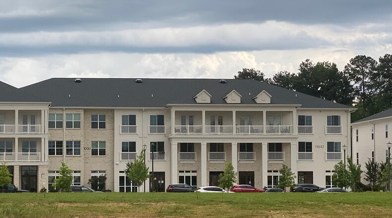 In 2017, Fuqua Development planned to bring a grocery store, office, retail and restaurant space to Roswell on Ga. 9, along with residential apartments. But only the apartments were ever built, and the rest of the 18-acre property is still empty.