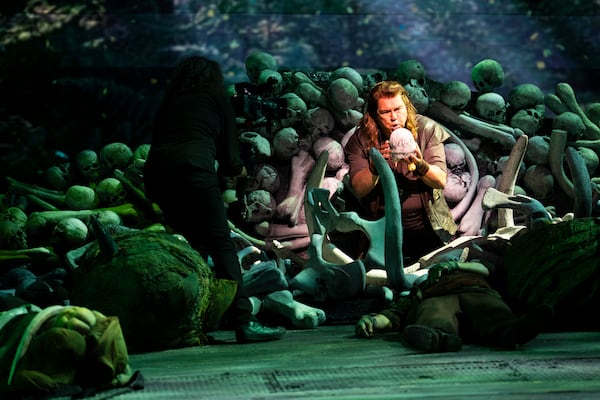 Dressed head-to-toe in black, Barral is nearly invisible as he captures an intense moment during a scene from "Siegfried." (Olivia Bowdoin for the AJC)