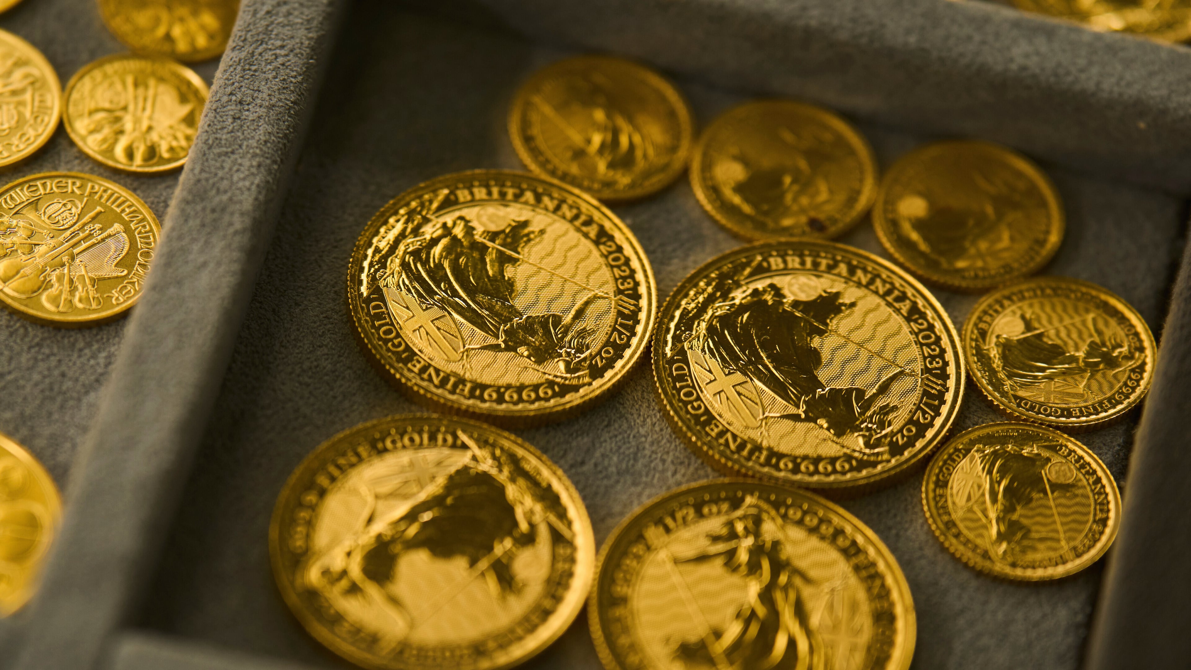 FILE - A collection of gold coins is displayed at a shop in the St. Vincent Jewelry Center in the Jewelry District of Los Angeles, April 30, 2025. (AP Photo/Jae C. Hong, file)