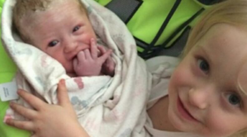 Kaitlyn and her new sister