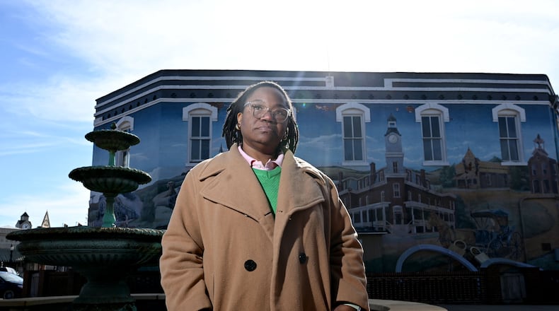 Ingrid Jackson, who bought a car from U.S. Auto Sales, said she was among the customers who had their car disabled by a kill switch system that impacted thousands of buyers across the Southeast who had paid their car loans on time. She is pictured in Barnesville, Ga., where she lives. (Hyosub Shin / AJC)