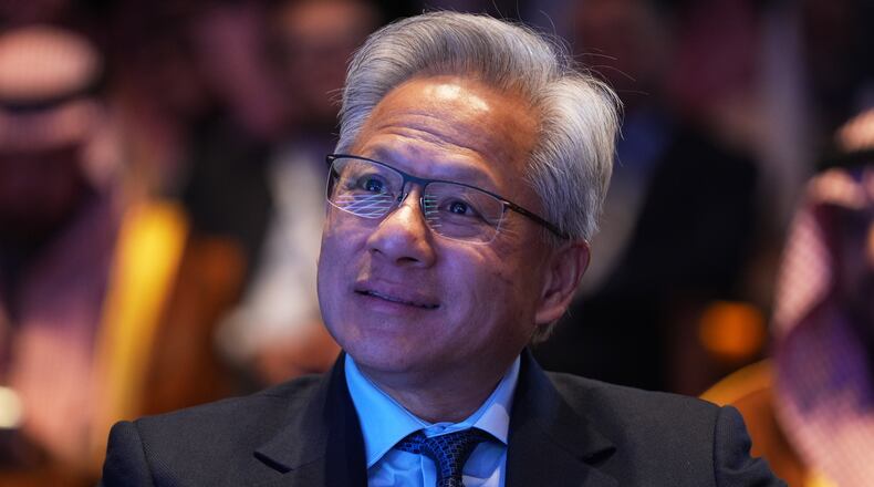 Nvidia CEO Jensen Huang listens as President Donald Trump speaks during the Saudi Investment Forum at the Kennedy Center, Wednesday, Nov. 19, 2025, in Washington. (AP Photo/Evan Vucci)