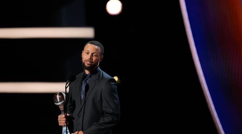 Basketball player Stephen Curry accepts the Muhammad Ali Sports Humanitarian Award at the ESPY Awards in the David H. Koch Theater at Lincoln Center Wednesday, July 15, 2026, in New York. (AP Photo/Frank Franklin II)
