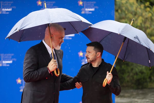 Albania's Prime Minister Edi Rama, left, welcomes President of Ukraine Volodymyr Zelenskyy at the 6th European Political Community (EPC) Summit in Tirana, Albania, Friday, May 16, 2025. (Peter Klaunzer/Keystone via AP)