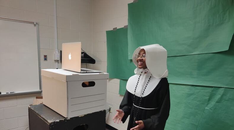 Students from Duluth High School's production of the musical 'Sister Act, Jr.' performed in costumes as nun characters and the pope -- in front of a makeshift green screen and school laptops -- to compete in the 2021 Shuler Awards presented by ArtsBridge Foundation. (Courtesy ArtsBridge Foundation)