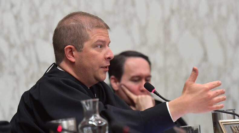 Georgia state Supreme Court Justice Nels S.D. Peterson asks a question during a hearing Tuesday. The court is considering an appeal of a case alleging tens of thousands of votes disappeared in the race for lieutenant governor. Plaintiffs in the case say Democrat Sarah Riggs Amico could have won if votes hadn’t been lost or changed by Georgia’s outdated electronic voting machines. HYOSUB SHIN / HSHIN@AJC.COM