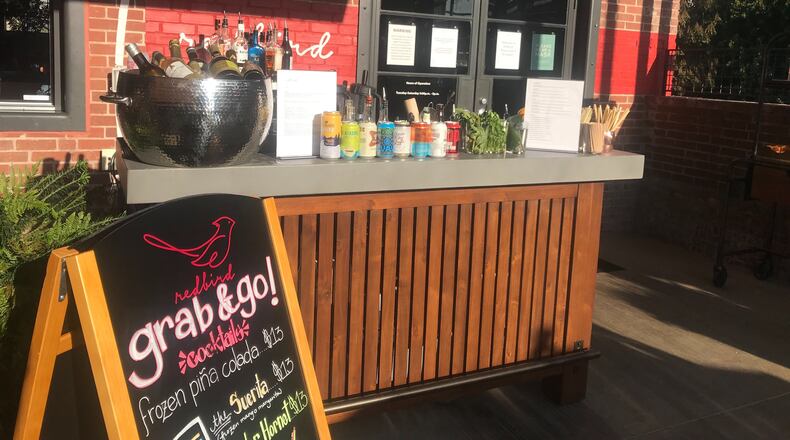 Redbird has erected an outdoor bar on its patio at Westside Provisions District. Ligaya Figueras / ligaya.figueras@ajc.com