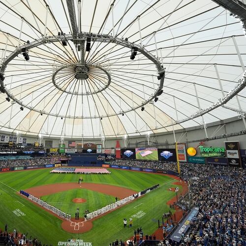 FILE - Players from the Chicago Cubs and Tampa Bay Rays are introduced before a baseball game Monday, April 6, 2026, in St. Petersburg, Fla. (AP Photo/Chris O'Meara, File)