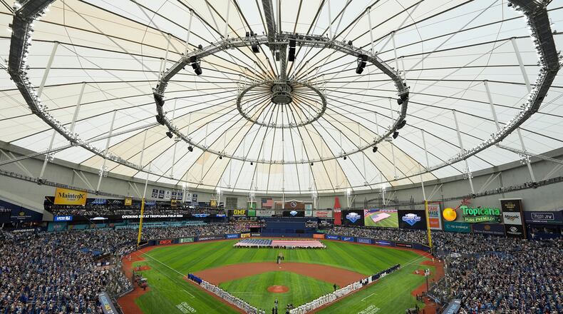 FILE - Players from the Chicago Cubs and Tampa Bay Rays are introduced before a baseball game Monday, April 6, 2026, in St. Petersburg, Fla. (AP Photo/Chris O'Meara, File)