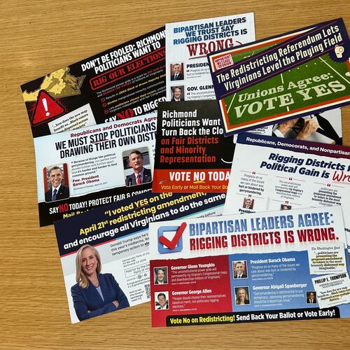 Campaign direct mail advertisements about a Virginia special election on redistricting are on display in Arlington, Va., on April 16, 2026. (AP Photo/Robert Yoon)