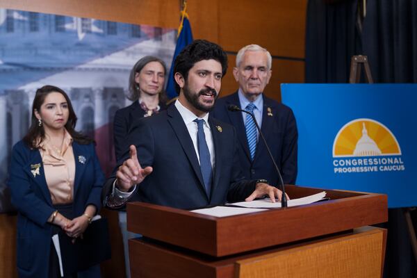 U.S. Rep. Greg Casar, D-Texas (center) said an investigation into possible insider trading by members of Congress is needed.