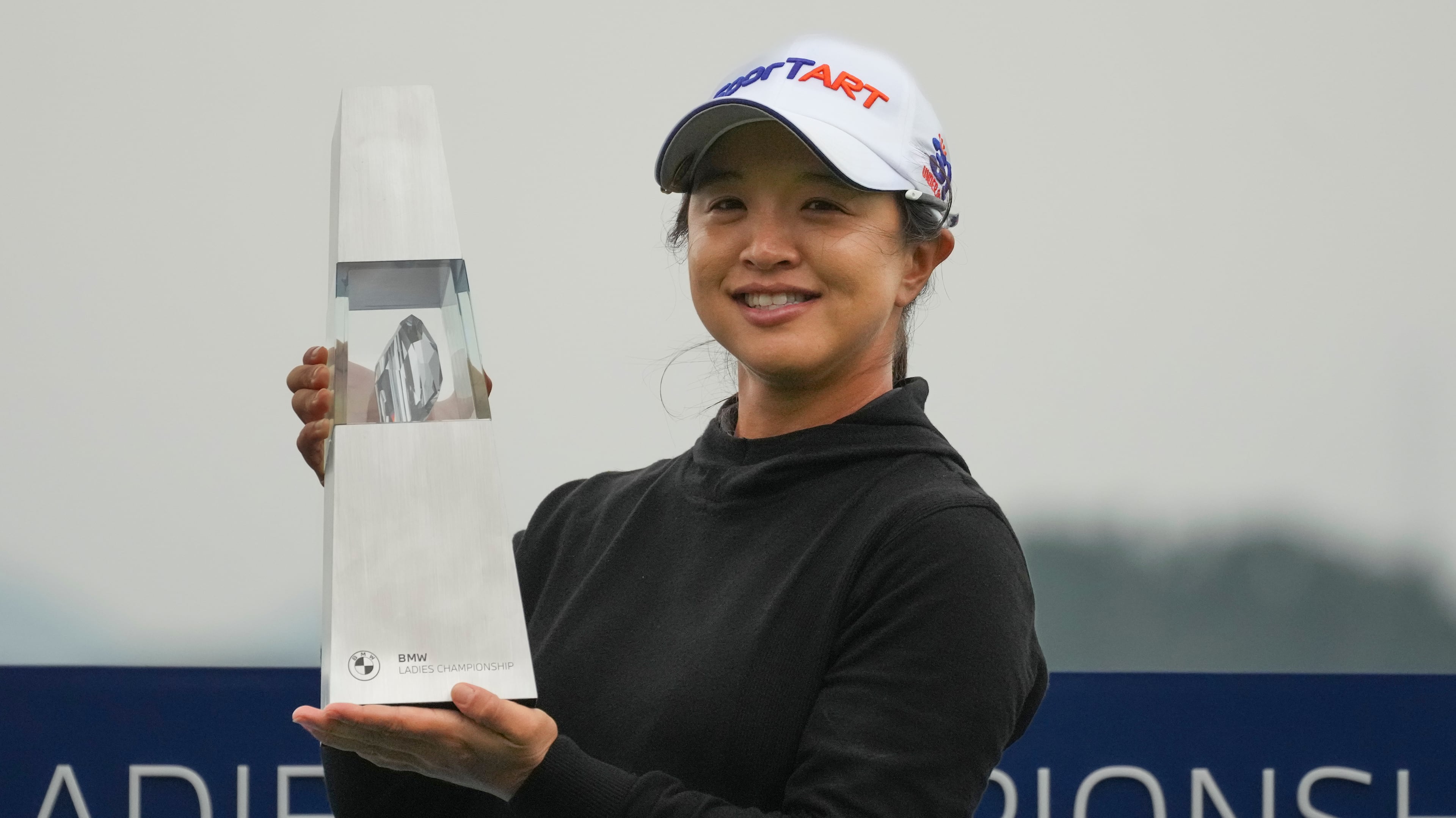Sei Young Kim of South Korea holds the winning trophy during the awards ceremony after winning the LPGA Ladies Championship golf tournament at the Pine Beach Golf Links, in Haenam, South Korea, Sunday, Oct. 19, 2025. (AP Photo/Lee Jin-man)