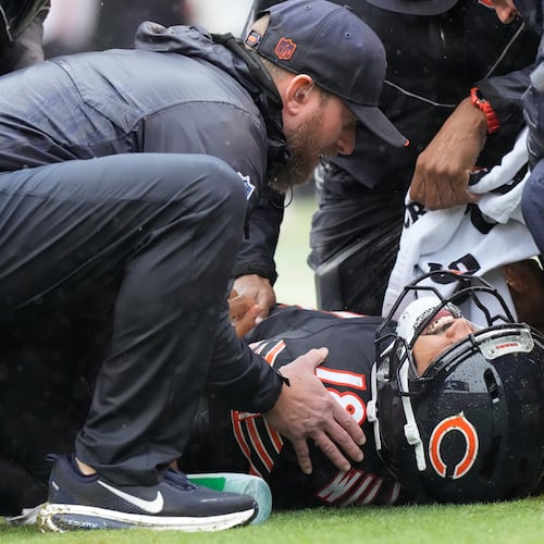 Chicago Bears quarterback Caleb Williams (18) lies on the field during the second half of an NFL football game against the Minnesota Vikings in Chicago, Sunday, Sept. 20, 2026. (AP Photo/Nam Y. Huh)