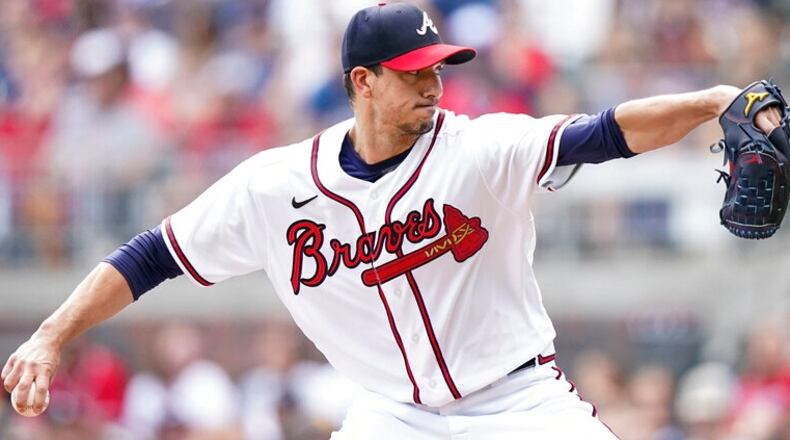Braves pitcher Charlie Morton delivers against the Padres on Saturday at Truist Park. (AP Photo/Brynn Anderson)