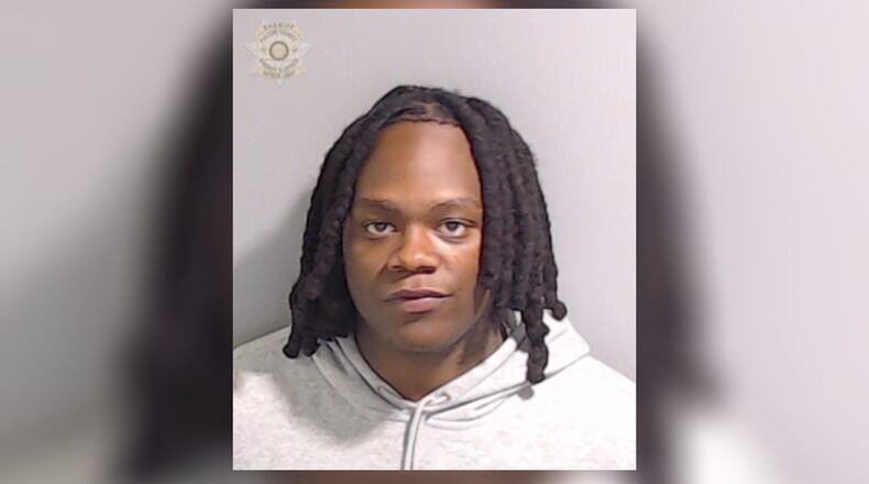 Davis Edmond, 21, was arrested Tuesday and is accused of providing transportation for at least two suspects in a shooting that left a man dead at a MARTA station last week.